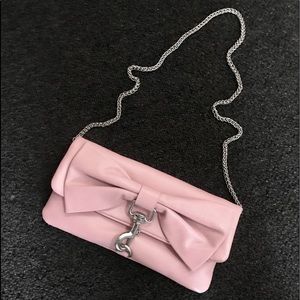 Precious pale pink Cynthia Rowley bow clutch.